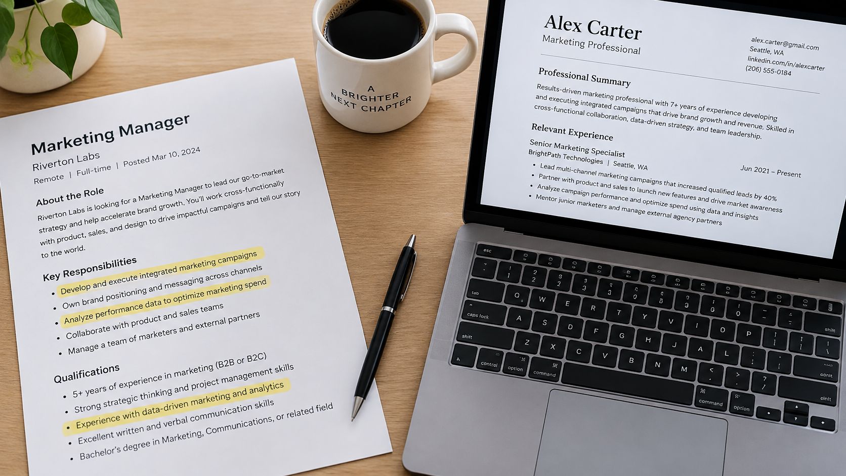 A marketing manager job description paper alongside a professional resume displayed on a laptop screen.