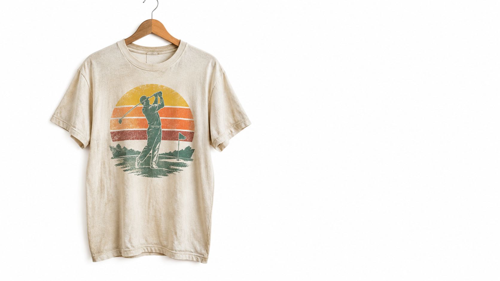 A beige vintage-style t-shirt featuring a retro sunset graphic of a golfer swinging a golf club.