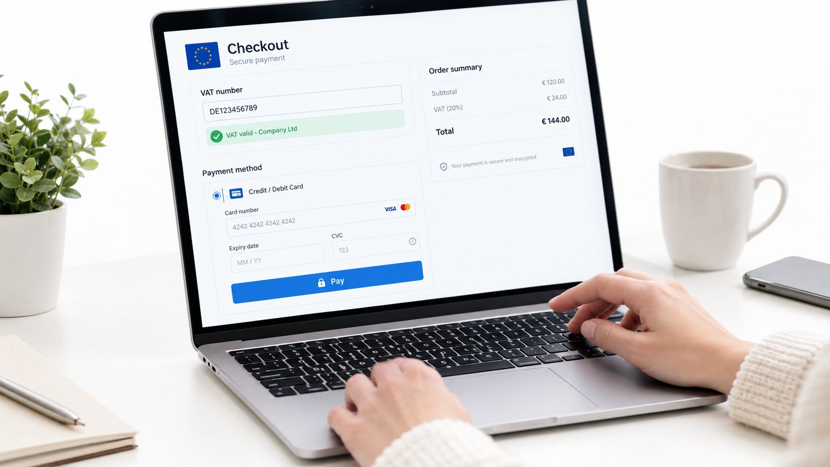 A person using a laptop to enter a German VAT number in an online checkout payment form.
