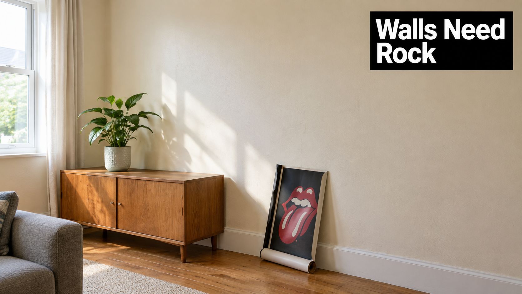 A minimalist living room with a mid-century wooden sideboard, a green potted plant, and a Rolling Stones poster.