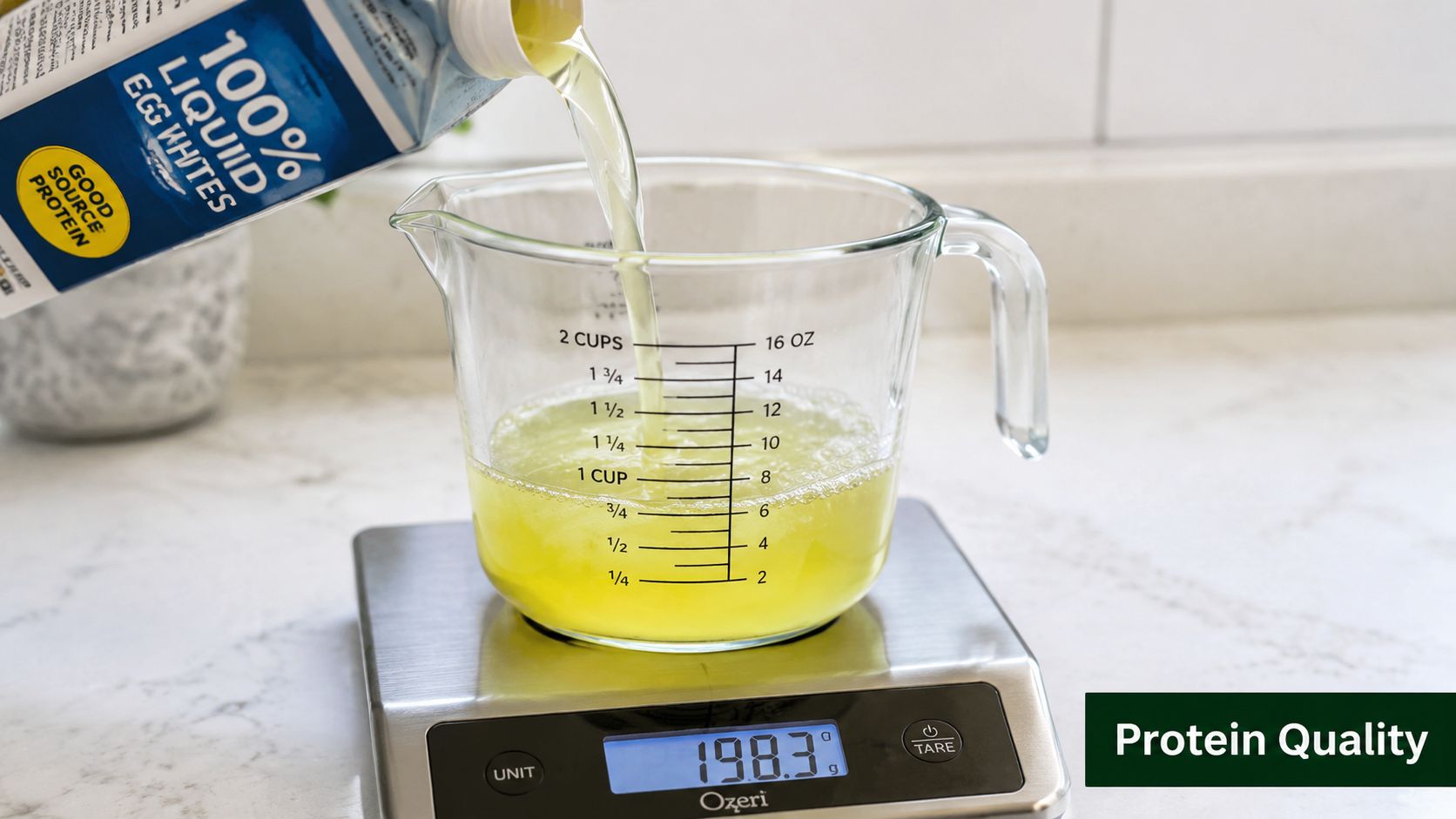 Liquid egg whites being poured from a container into a glass measuring cup on a kitchen scale.