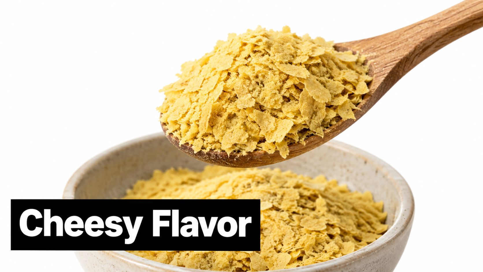 A wooden spoon held over a bowl, both filled with nutritious yellow nutritional yeast flakes.