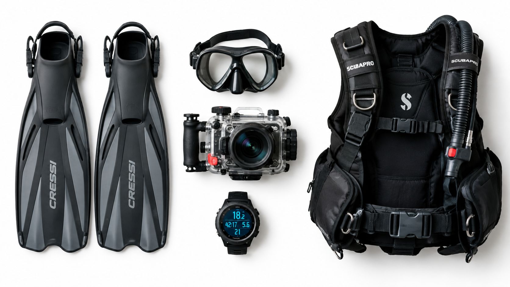 An overhead flatlay view of essential scuba diving equipment including fins, mask, camera, computer, and buoyancy vest.