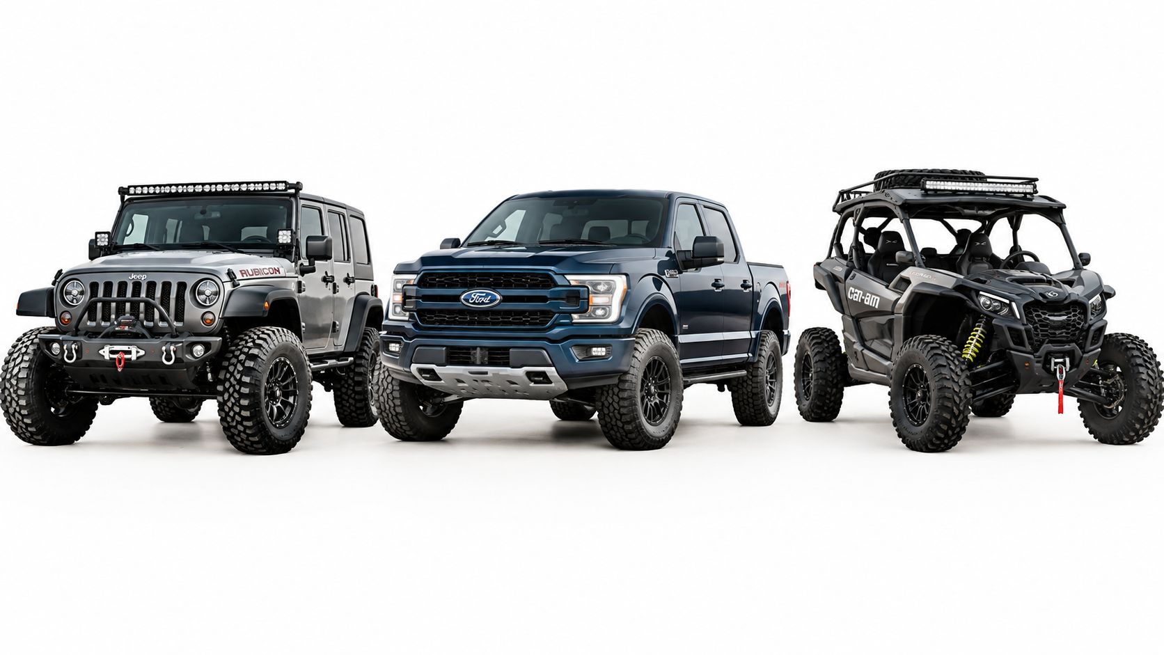 A gray Jeep Wrangler, a blue Ford pickup truck, and a dark Can-Am off-road vehicle side-by-side.
