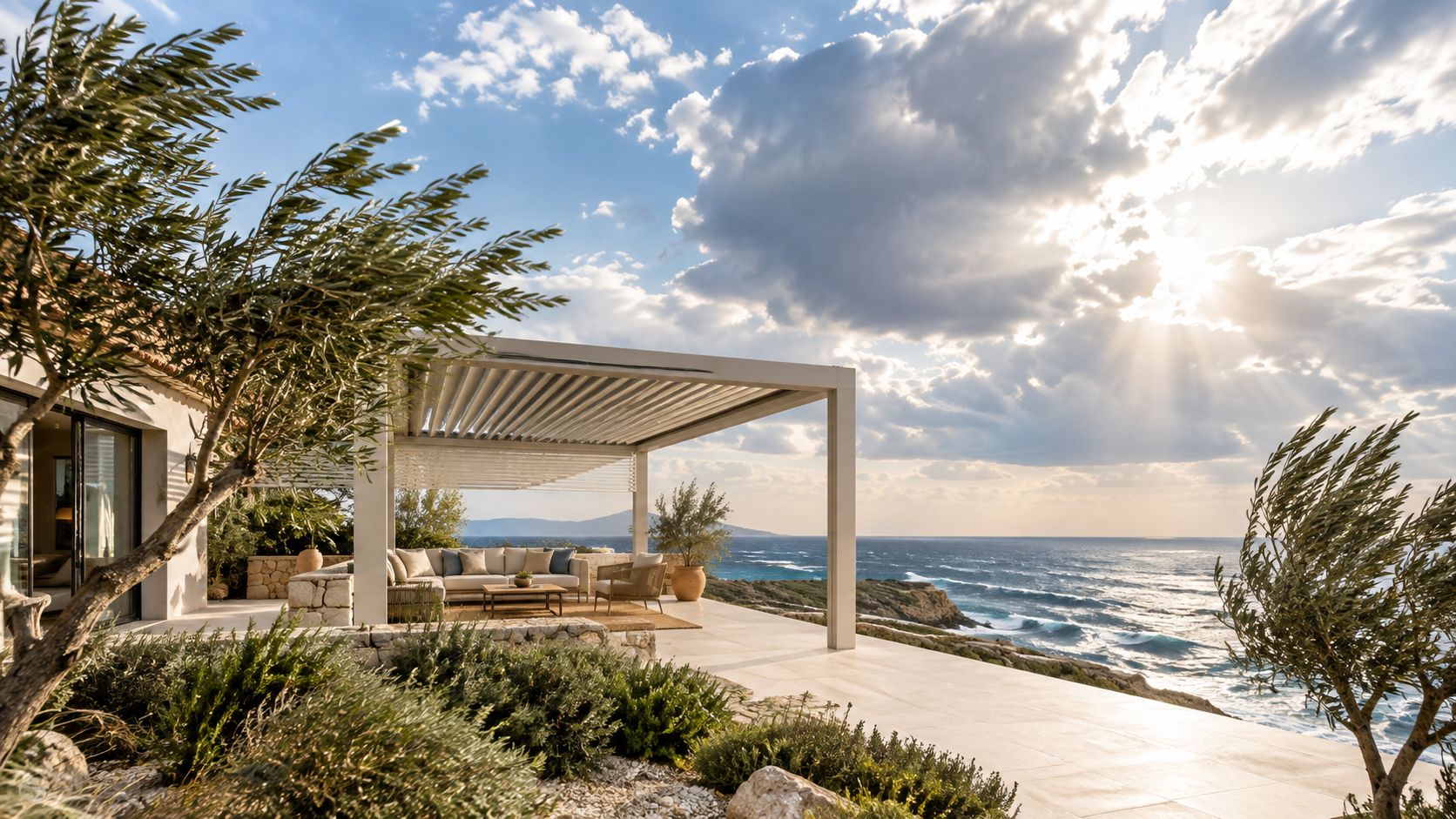 Une élégante pergola bioclimatique installée sur une terrasse surplombant la mer avec une vue imprenable.