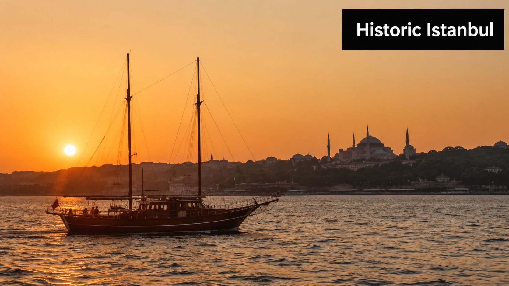 A scenic view of a wooden boat sailing on the Bosphorus in Istanbul at sunset.