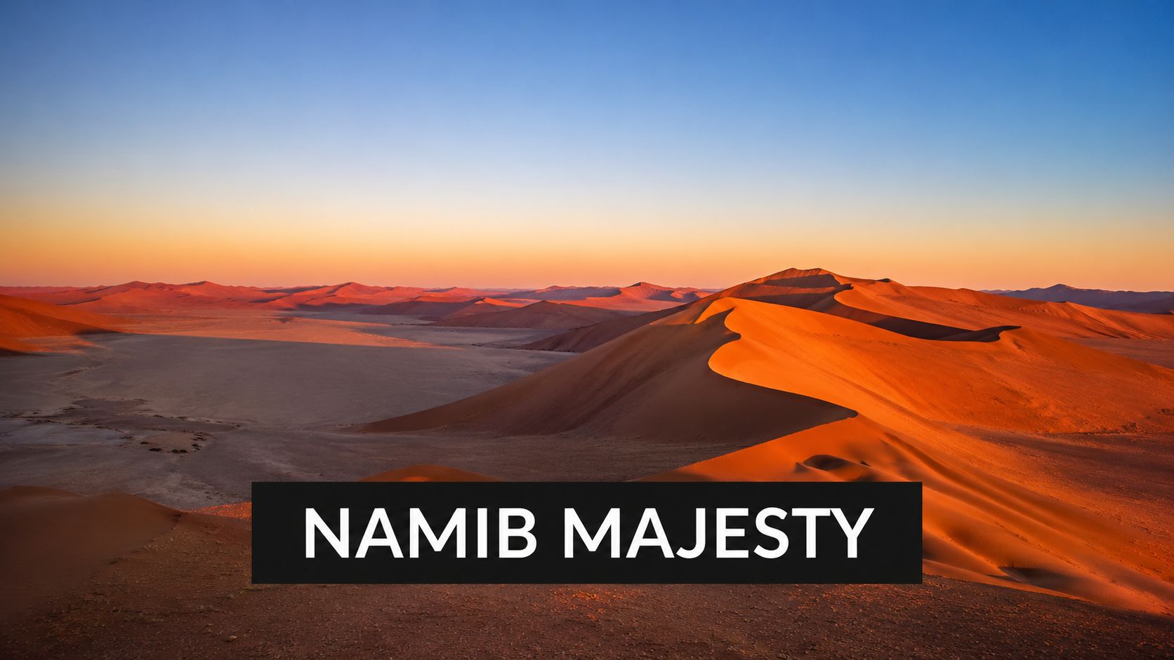 Golden sunset illuminating the vast, majestic sand dunes of the Namib Desert in Namibia.