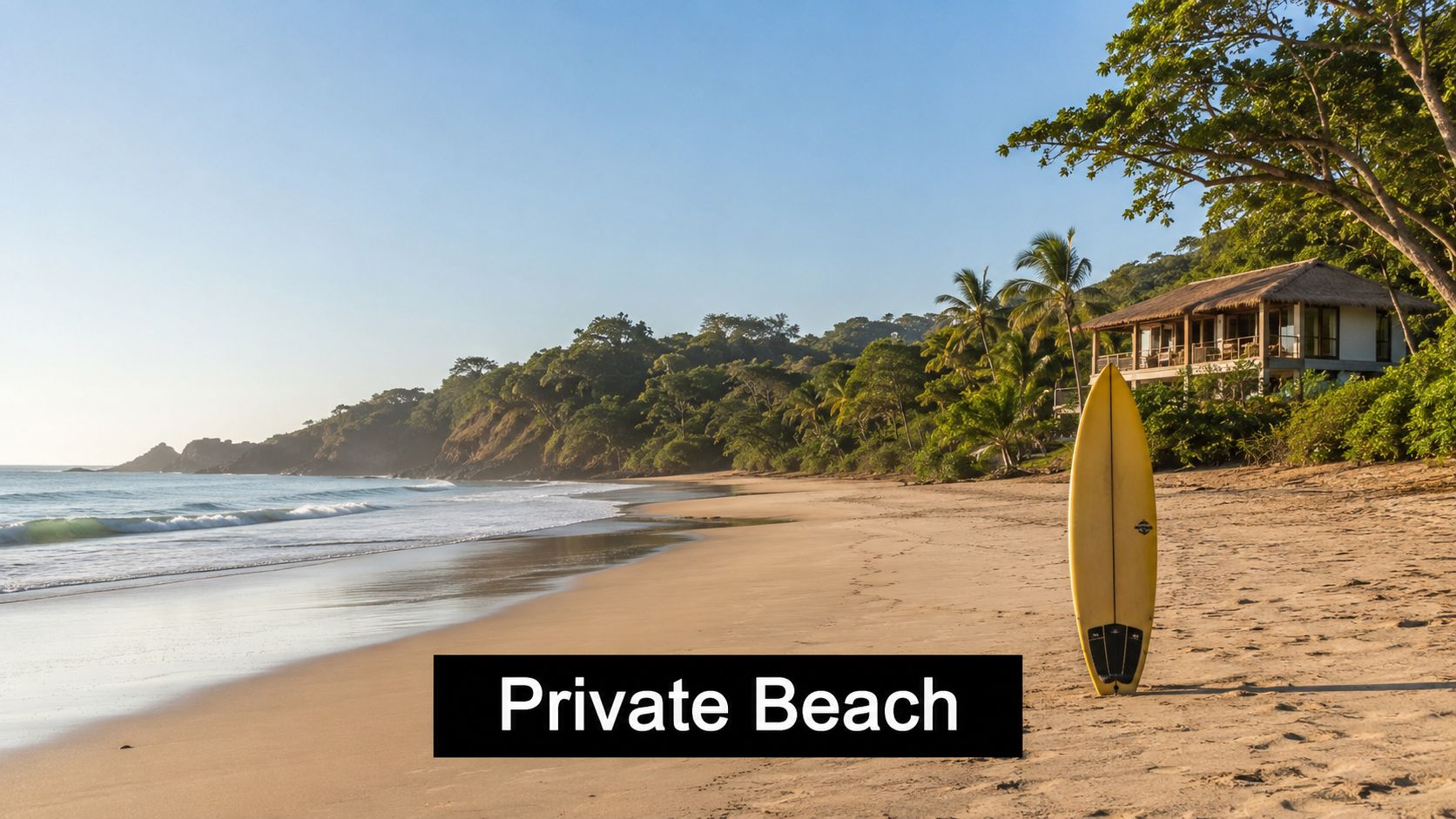 A yellow surfboard stands on the sand of a serene, secluded beach near a tropical luxury villa.