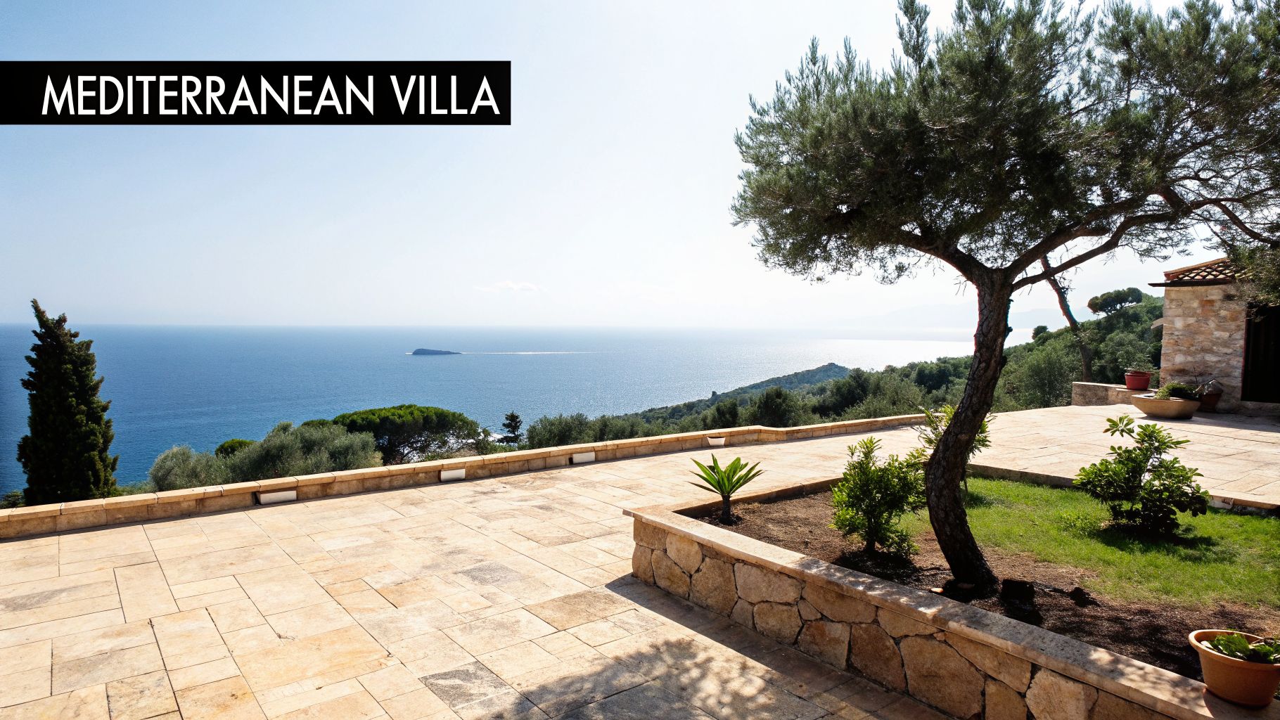 Stunning Mediterranean villa patio with an olive tree, offering panoramic views of the clear blue ocean.