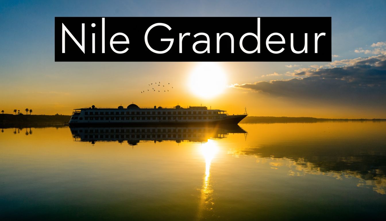 A luxurious cruise ship floats on the calm Nile river during a golden sunset in Egypt.