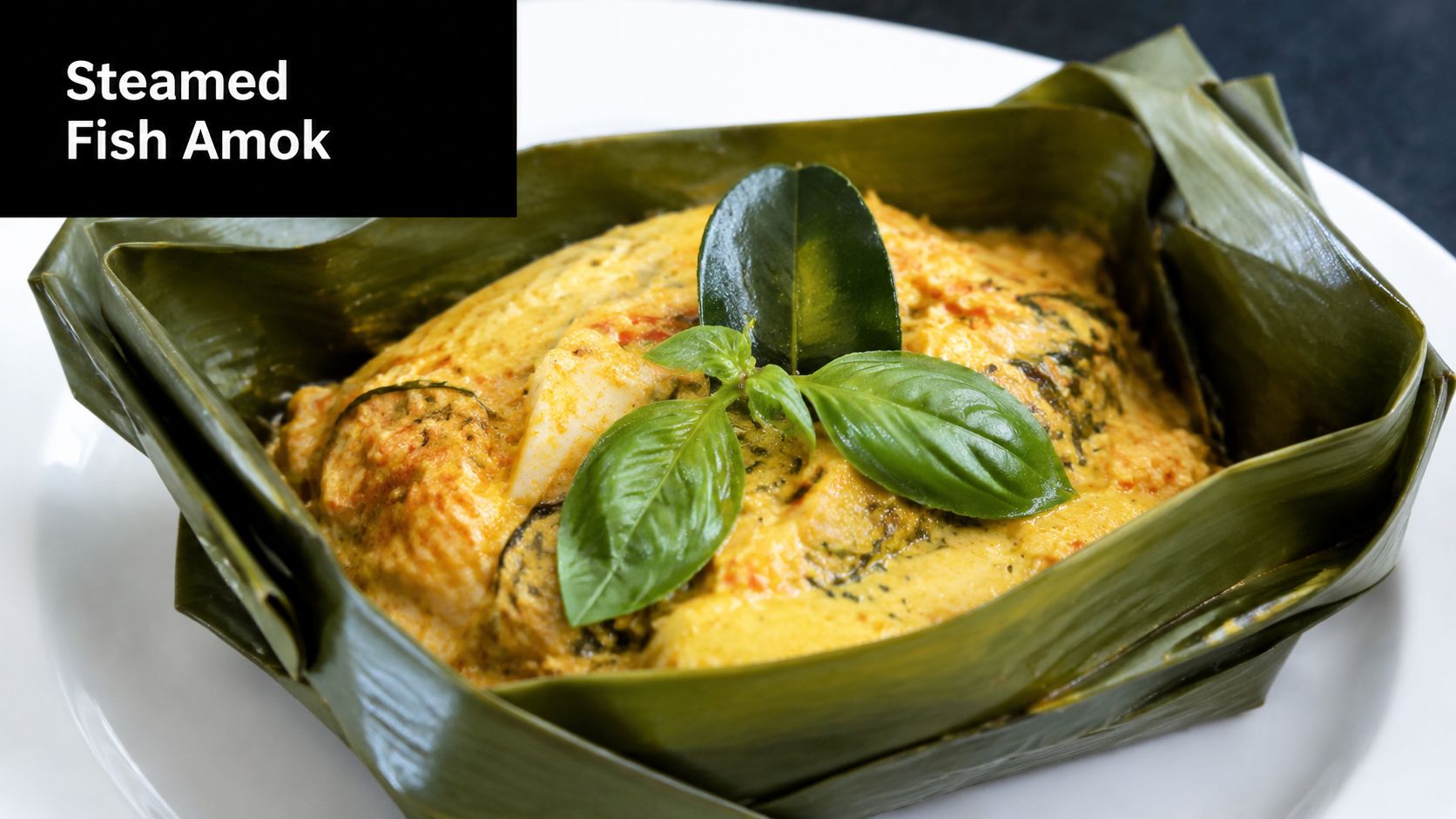 A close-up shot of traditional Cambodian Steamed Fish Amok served in a decorative banana leaf bowl.