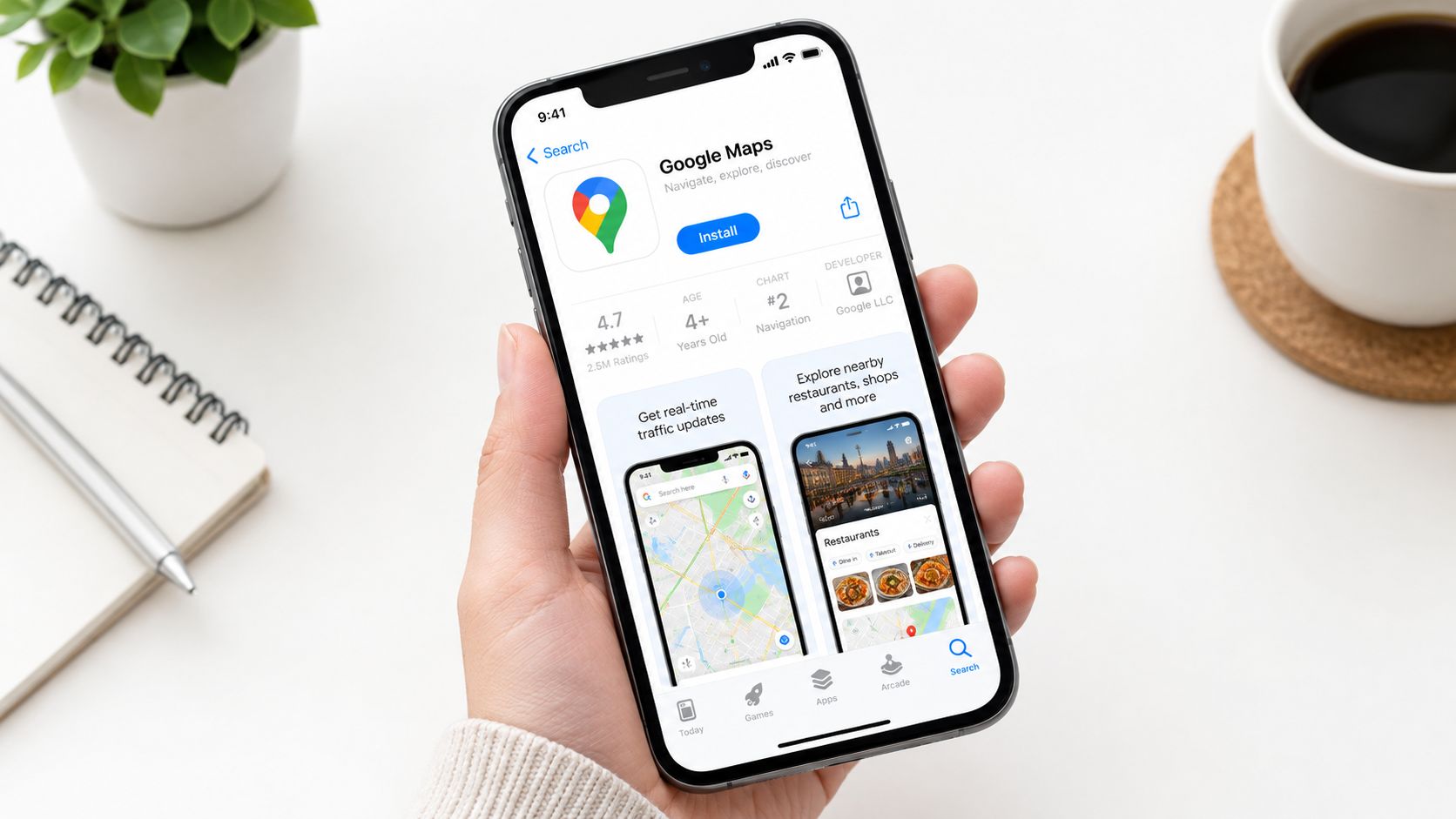 A hand holding a smartphone showing the Google Maps app store listing on an iPhone screen.