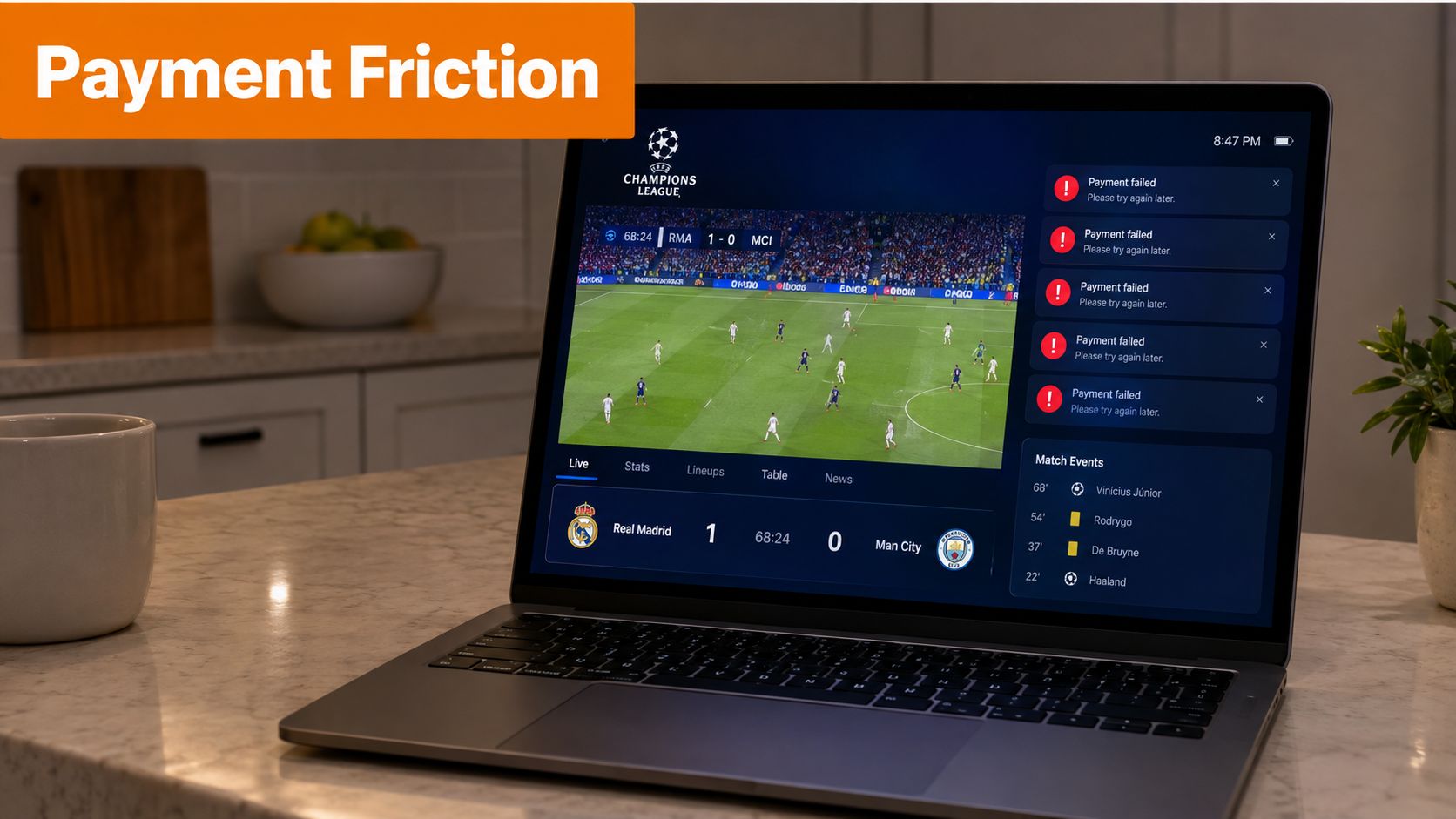 A laptop on a kitchen counter displaying a live soccer match with persistent payment failure notifications.