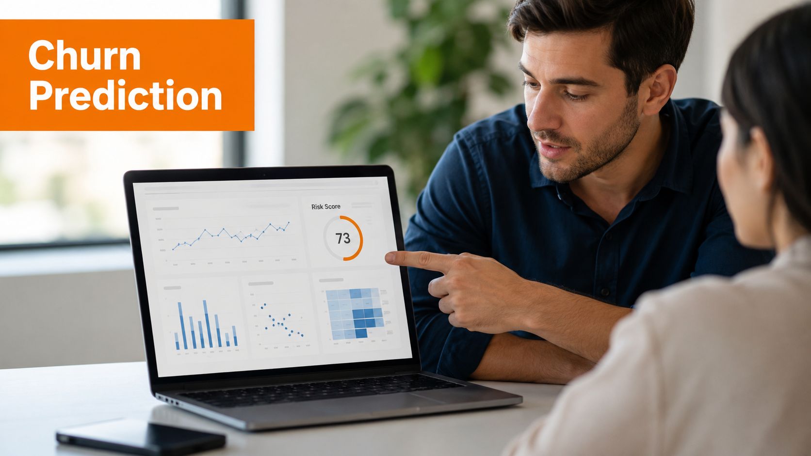 A professional man and woman looking at a laptop showing business charts and a churn risk score.