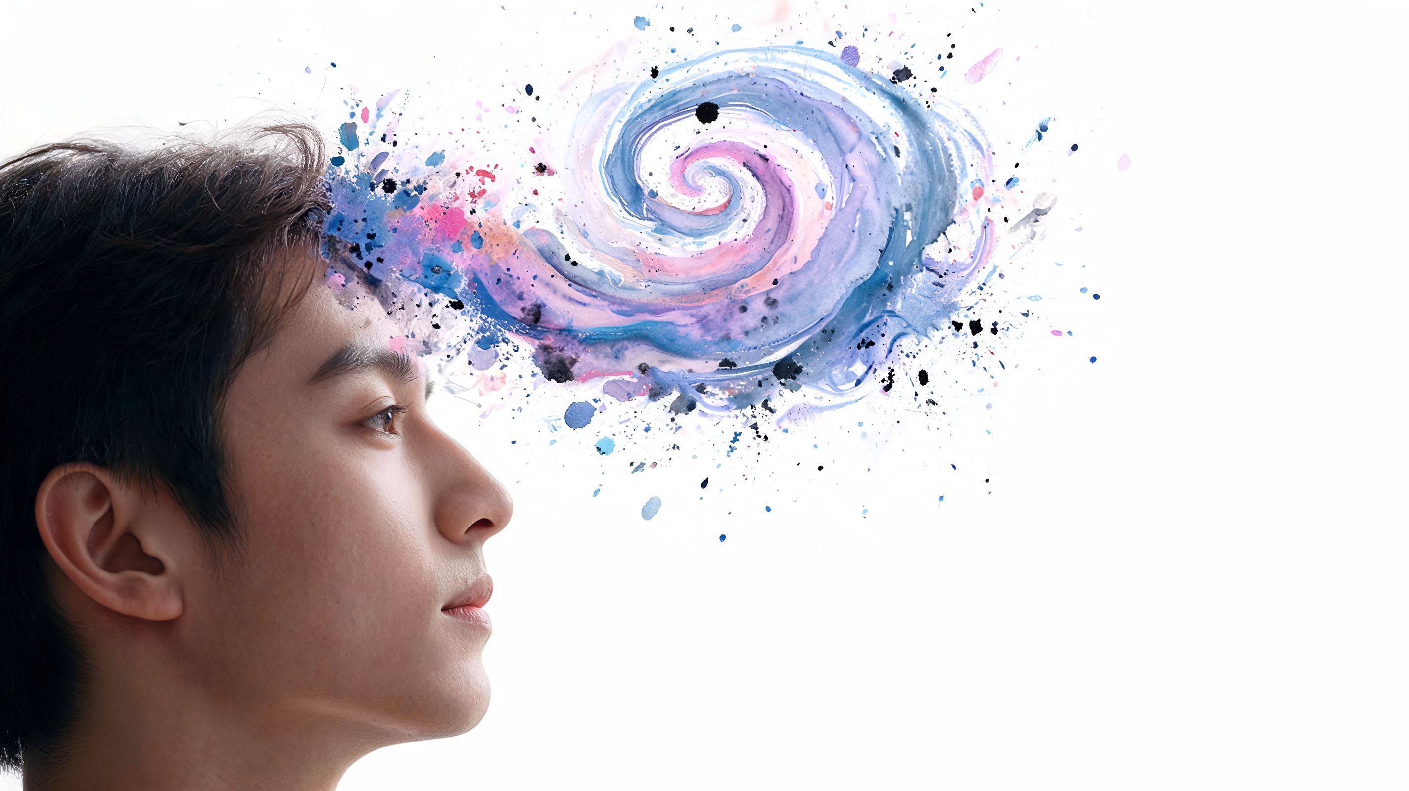A side profile of a young man with a creative, colorful watercolor swirl emerging from his mind.