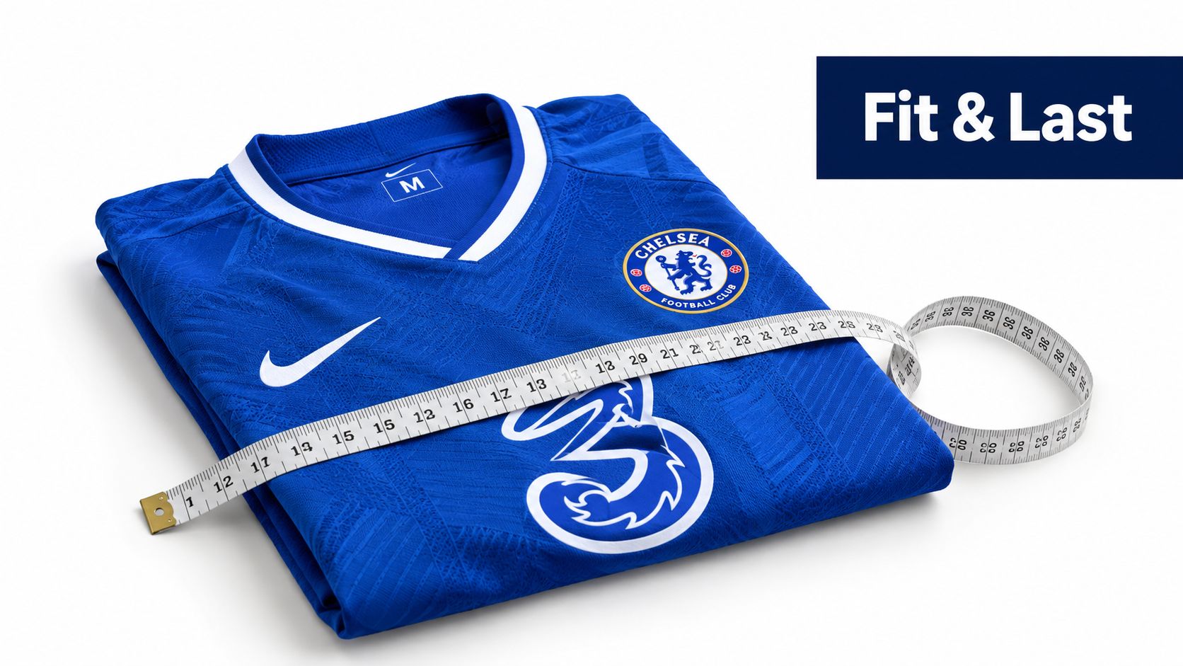 A blue Chelsea FC football jersey lies flat with a measuring tape placed across its chest.