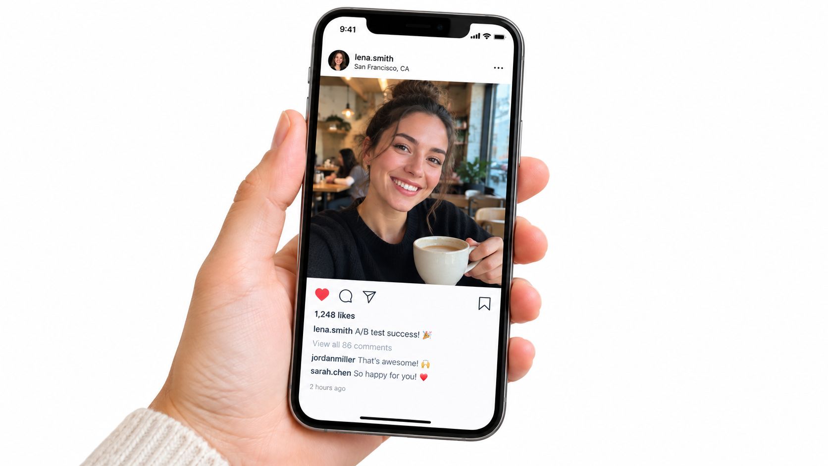 A hand holding a smartphone displaying a social media post with a photo of a woman.
