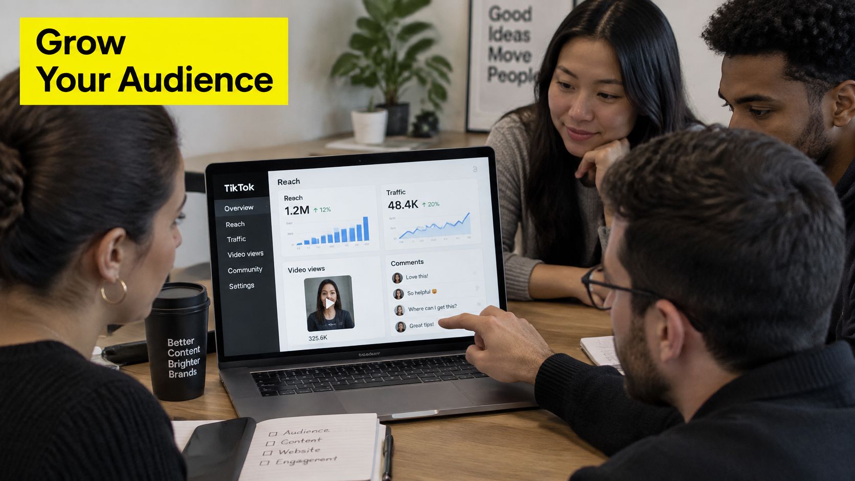 A diverse team collaborating in an office while reviewing TikTok analytics on a laptop screen together.