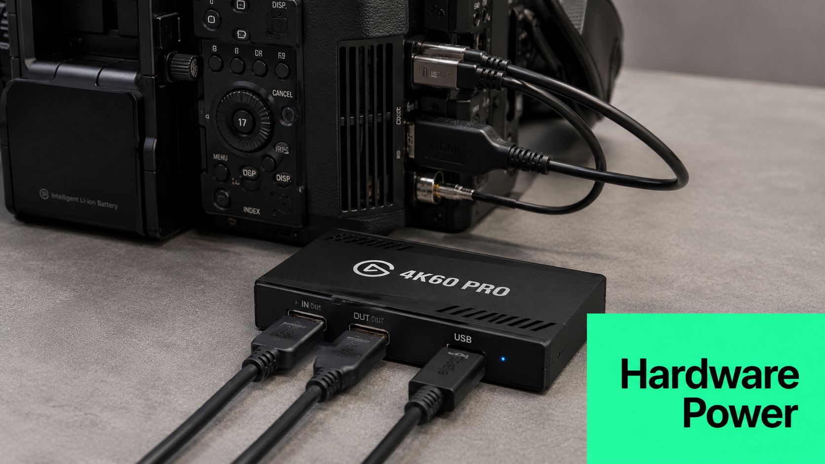 A professional video camera connected to an Elgato 4K60 Pro capture card for streaming on a desk.