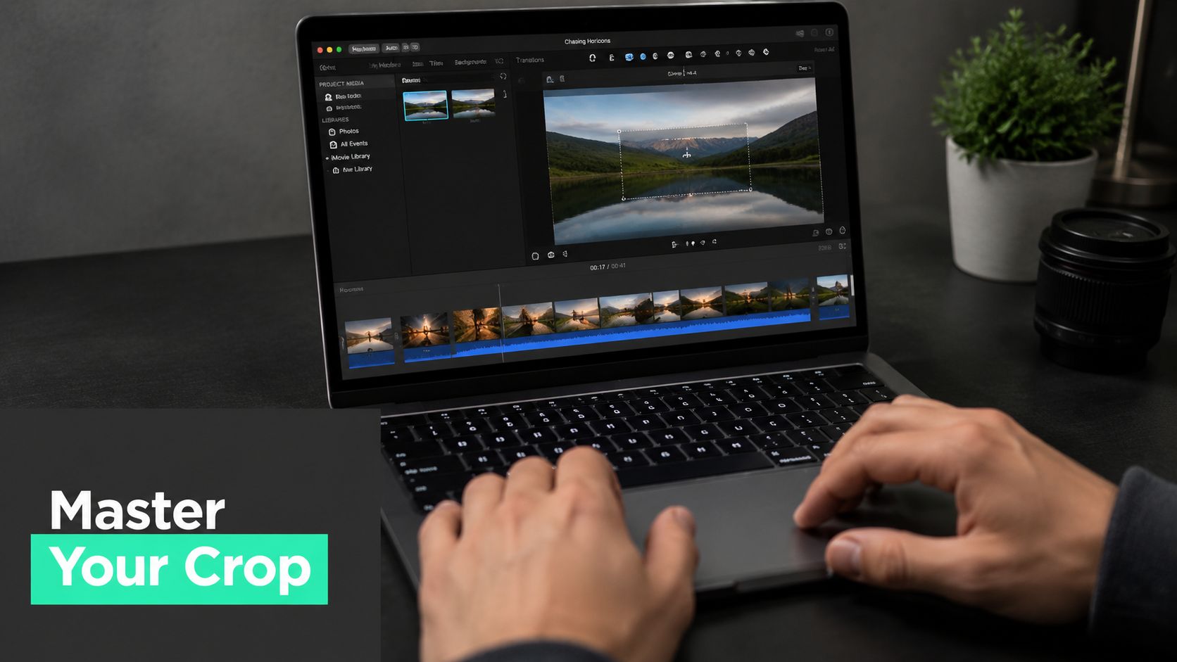 A person uses a laptop to edit a scenic landscape video project within the iMovie software application.