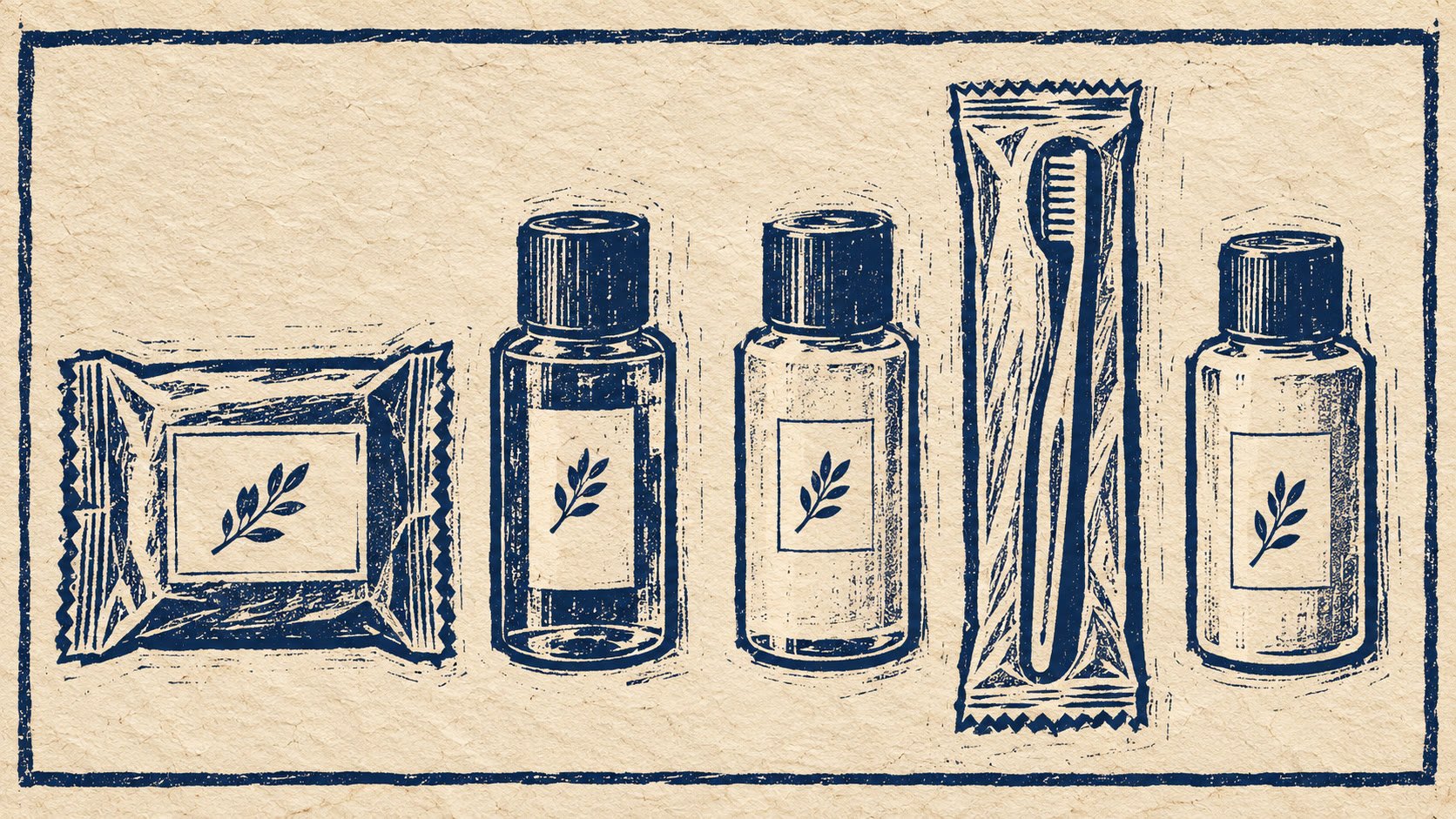 Individually wrapped hotel toiletries arranged on a bathroom vanity: soap, shampoo, conditioner, toothbrush, and lotion