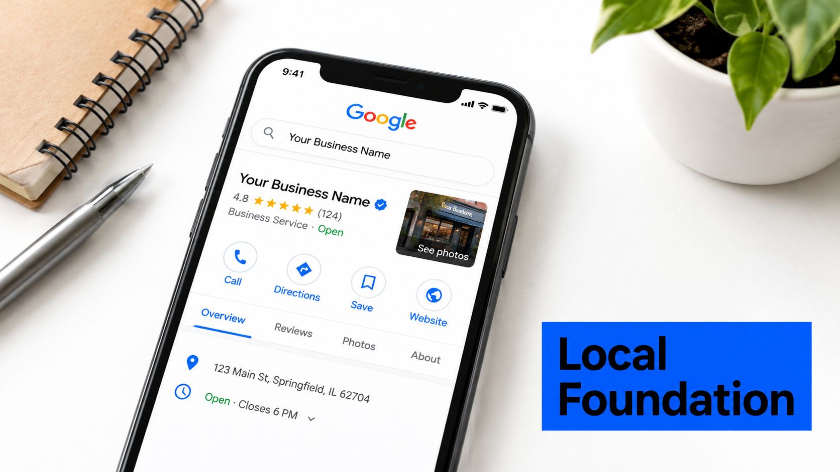 A smartphone screen displaying a Google Business Profile listing for a local business on a desk.