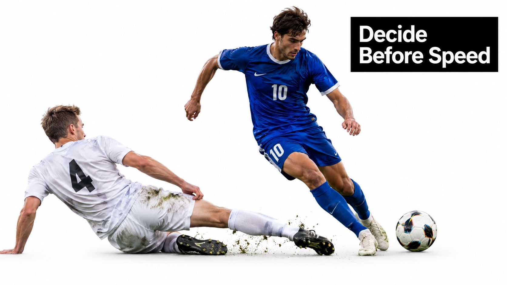 A soccer player in a blue jersey dribbling the ball while dodging a slide tackle from a white-jerseyed opponent.