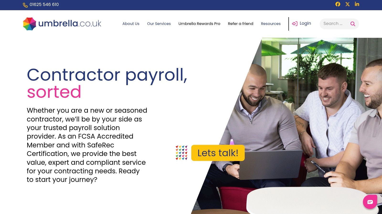 A professional reviewing payroll documents on a laptop, signifying compliance and security.