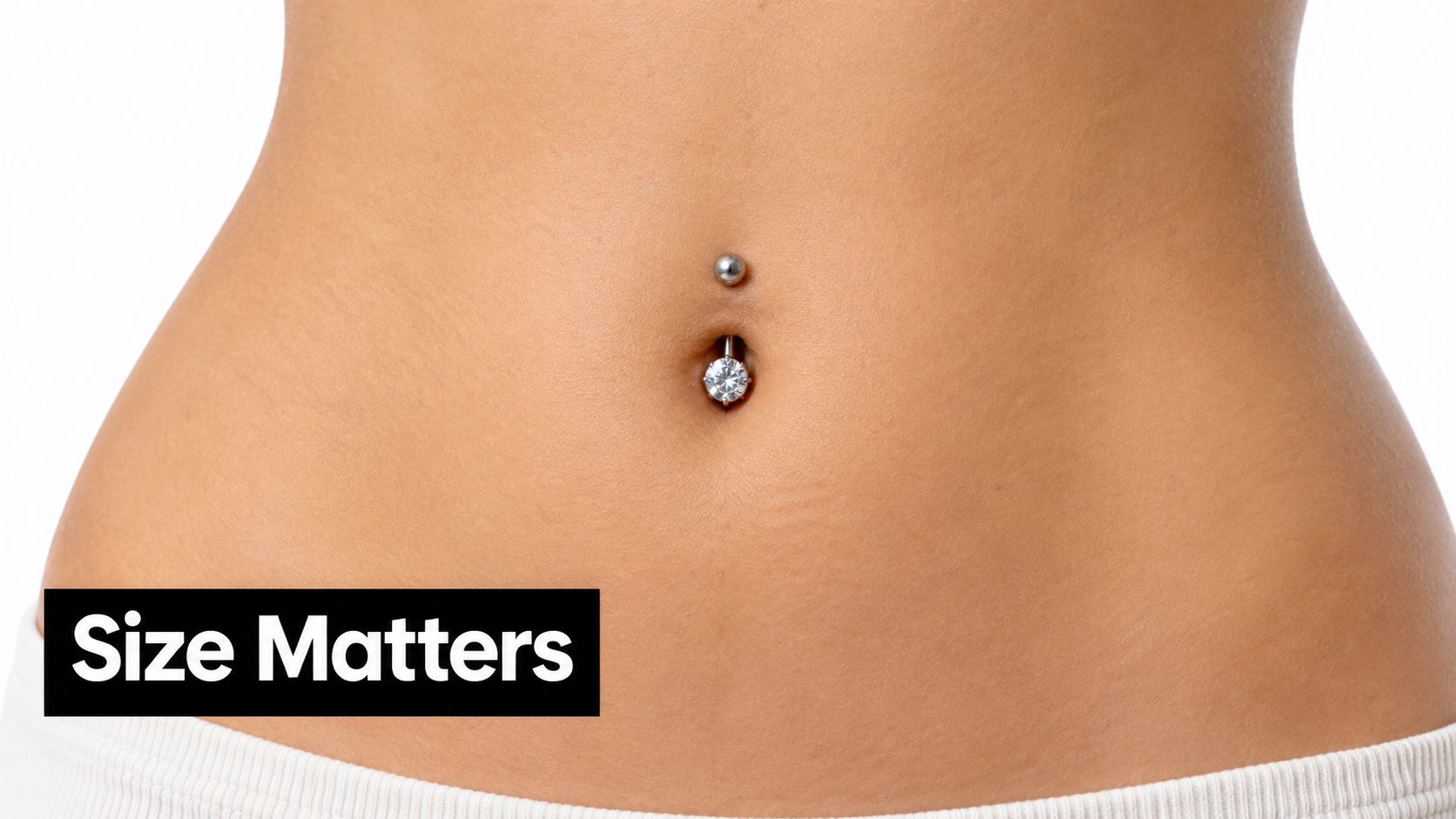 A close-up view of a woman's midriff featuring a elegant and minimalist belly button piercing ring.