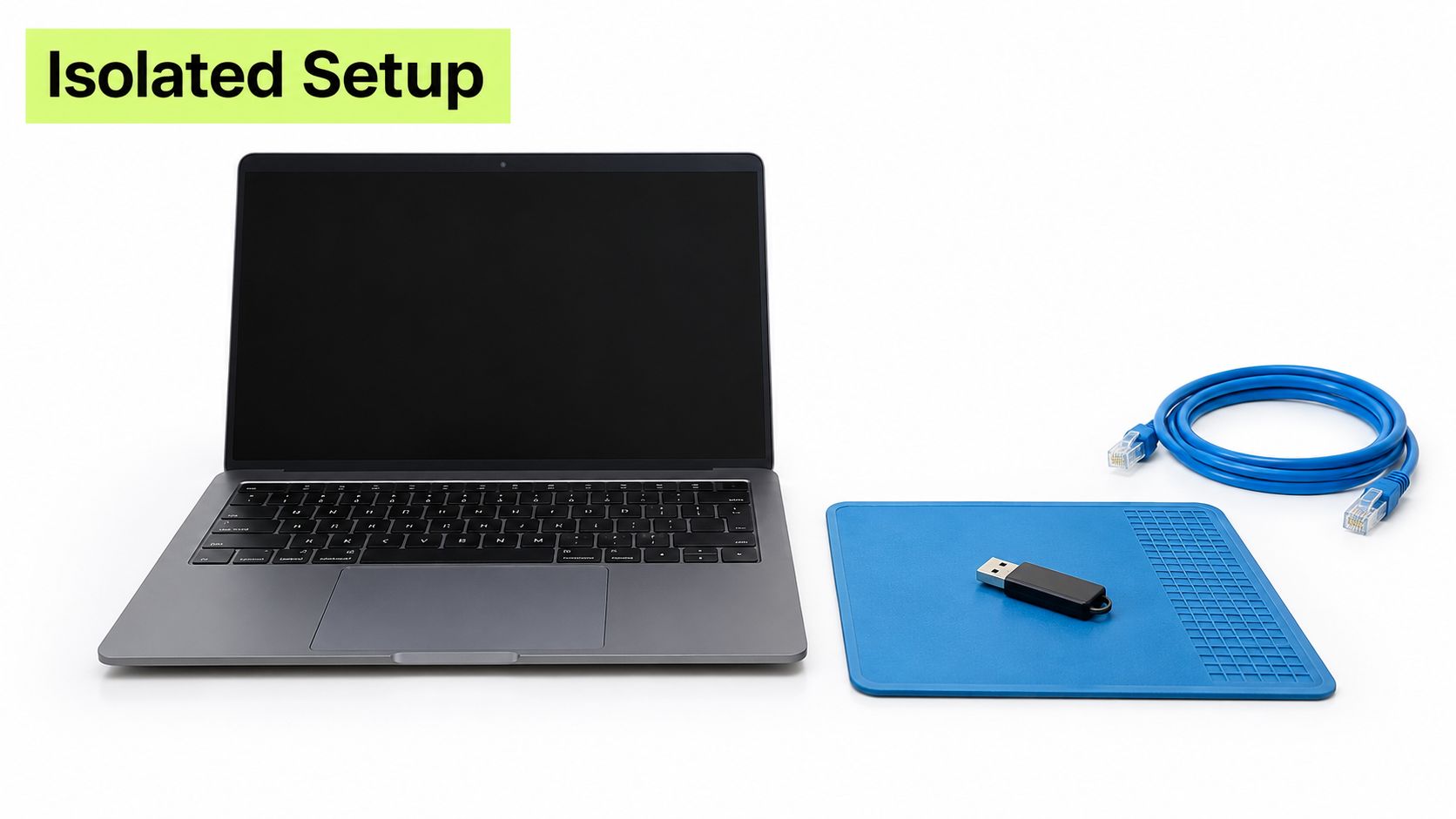 A gray laptop positioned next to a blue anti-static mat, a USB flash drive, and an Ethernet cable.