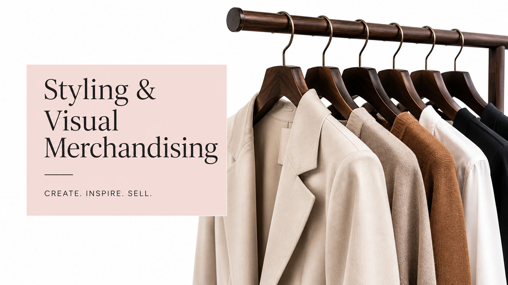 A row of dark wood hangers displaying various neutral and black clothing items against a white background.