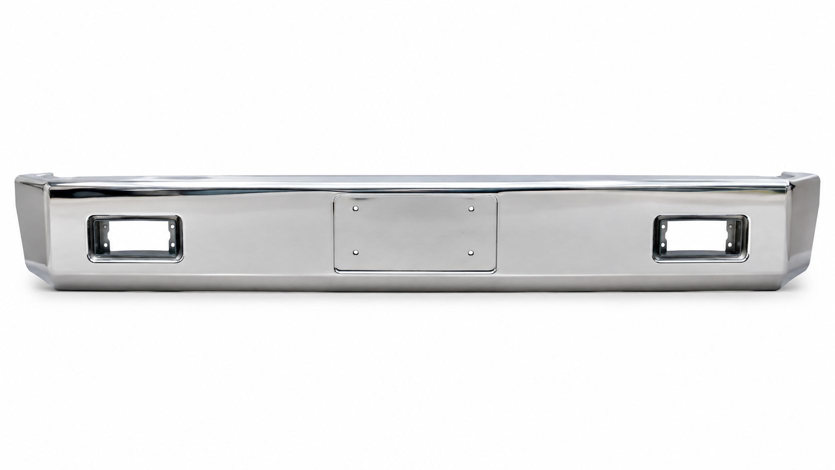 A shiny chrome rear step bumper for a commercial truck with license plate area and light cutouts.