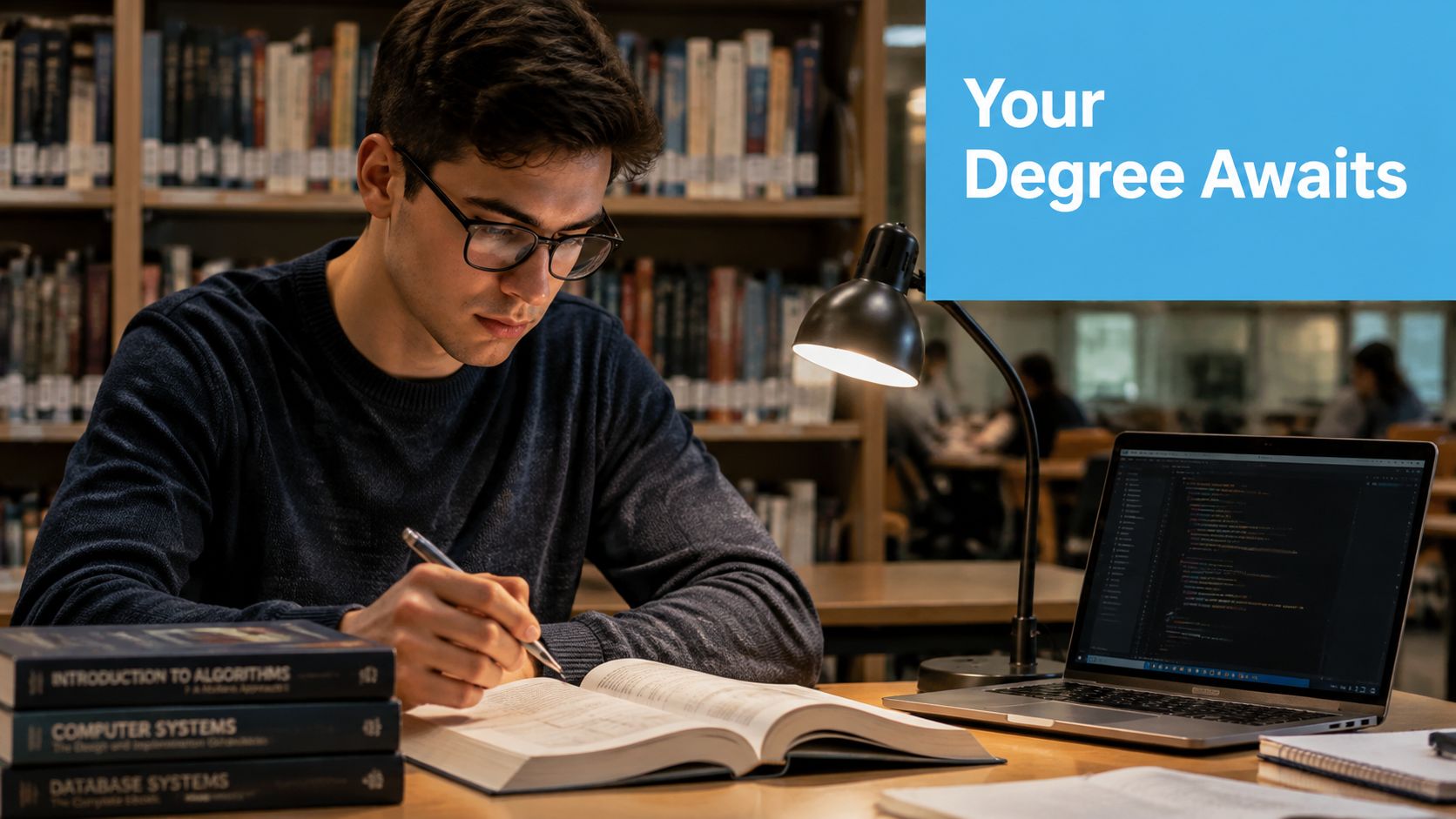 A male student in glasses studying computer science textbooks and coding on a laptop in a library.