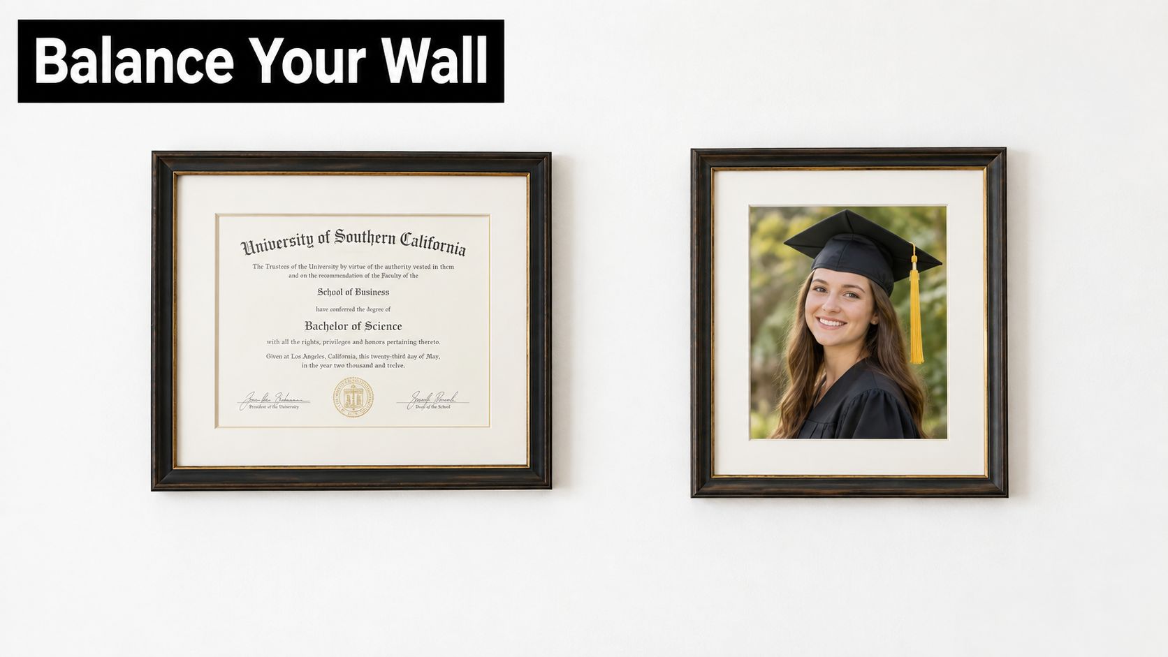 A diploma and a graduation portrait photo in matching elegant frames hanging on a white wall.