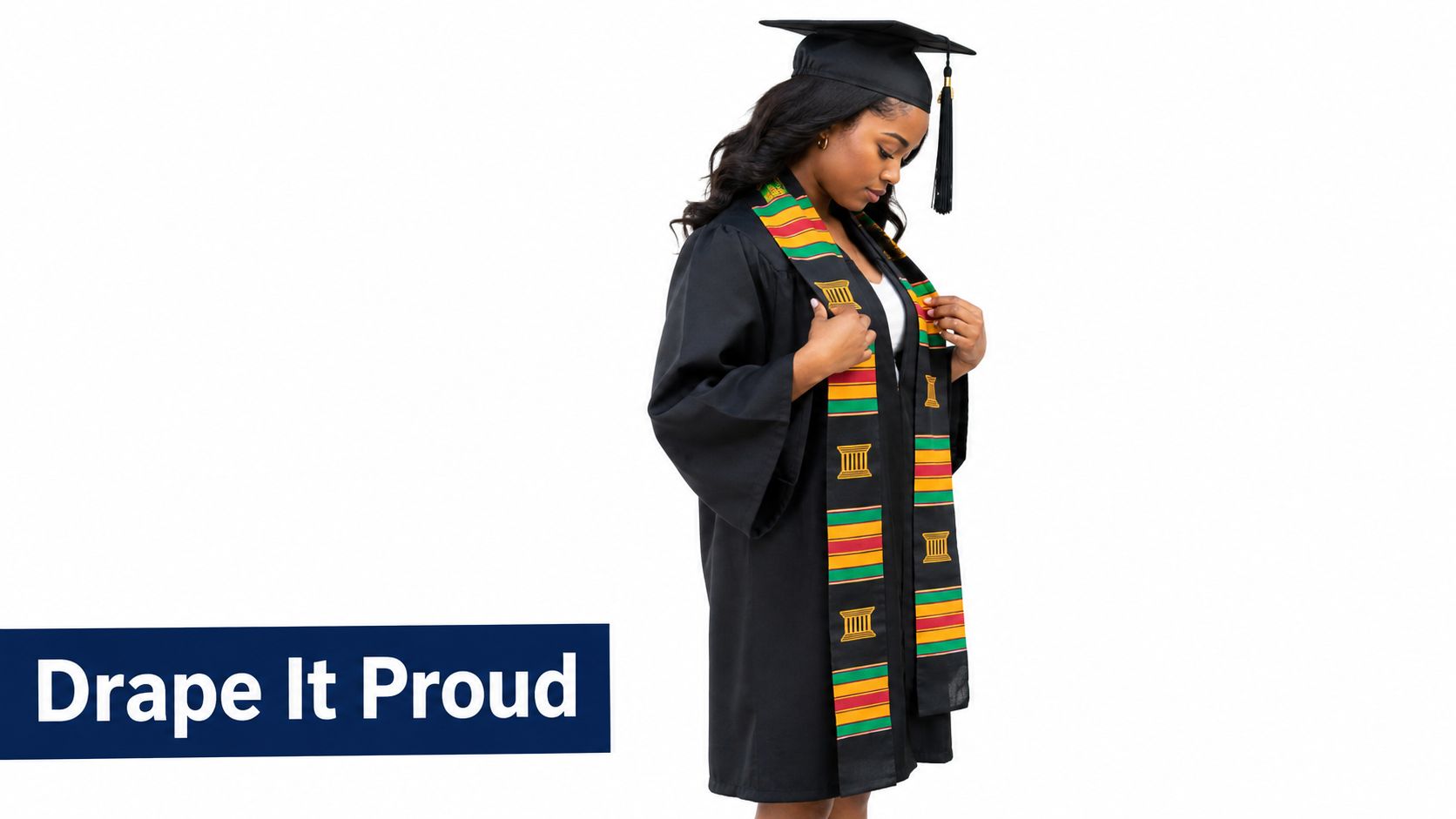 A woman wearing a graduation cap and gown with a colorful Kente cloth graduation stole.