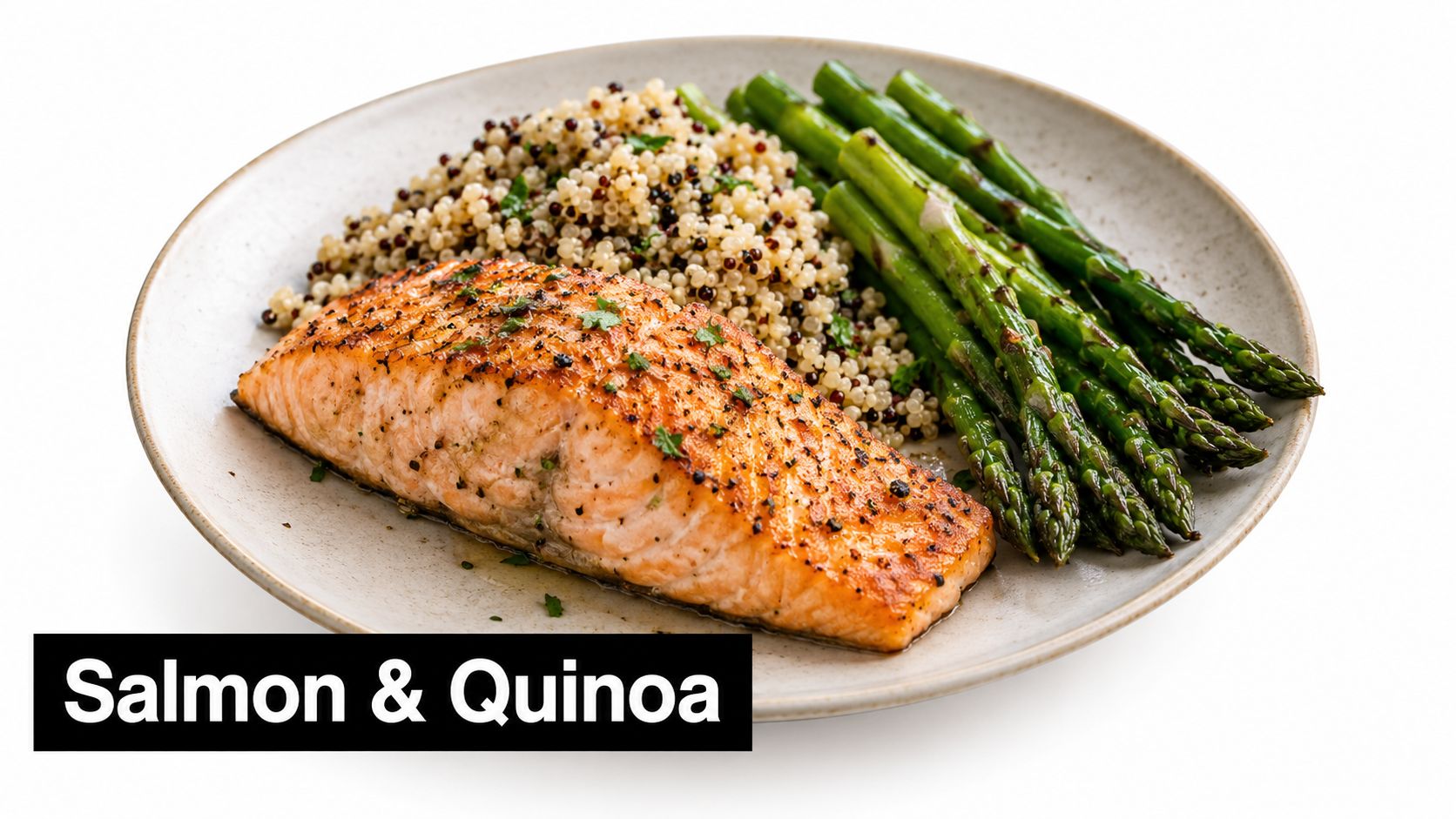A healthy plate featuring a perfectly seared salmon fillet served with fluffy quinoa and fresh grilled asparagus.