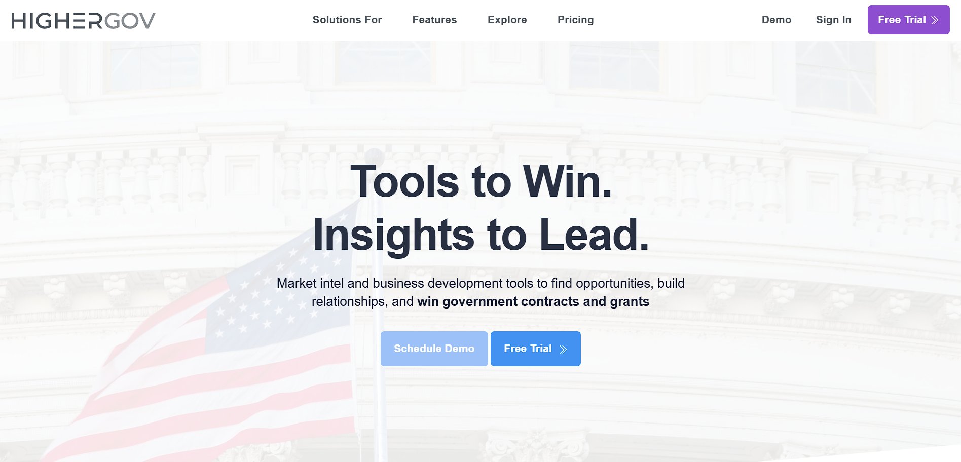 Highergov homepage displaying tools to win government contracts and grants, with a US flag overlay.