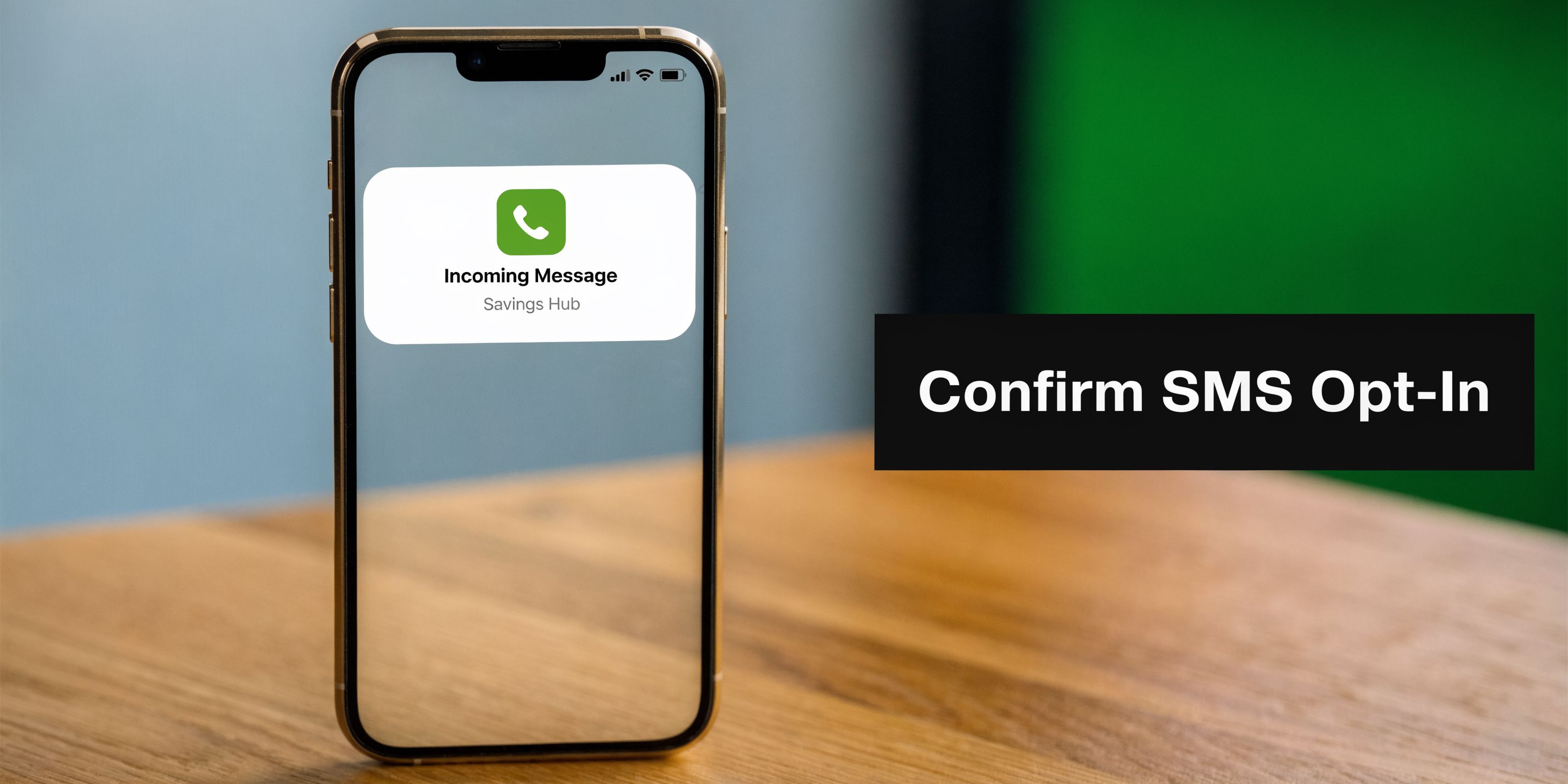 A smartphone screen displaying a notification for an SMS opt-in confirmation from Savings Hub.