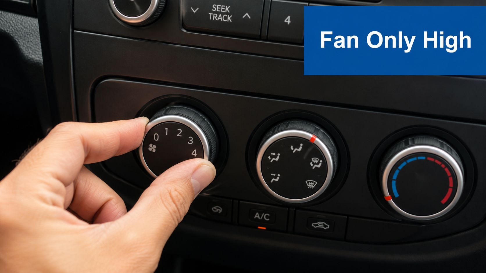A hand adjusts the car climate control knob to the highest fan speed setting on the dashboard.