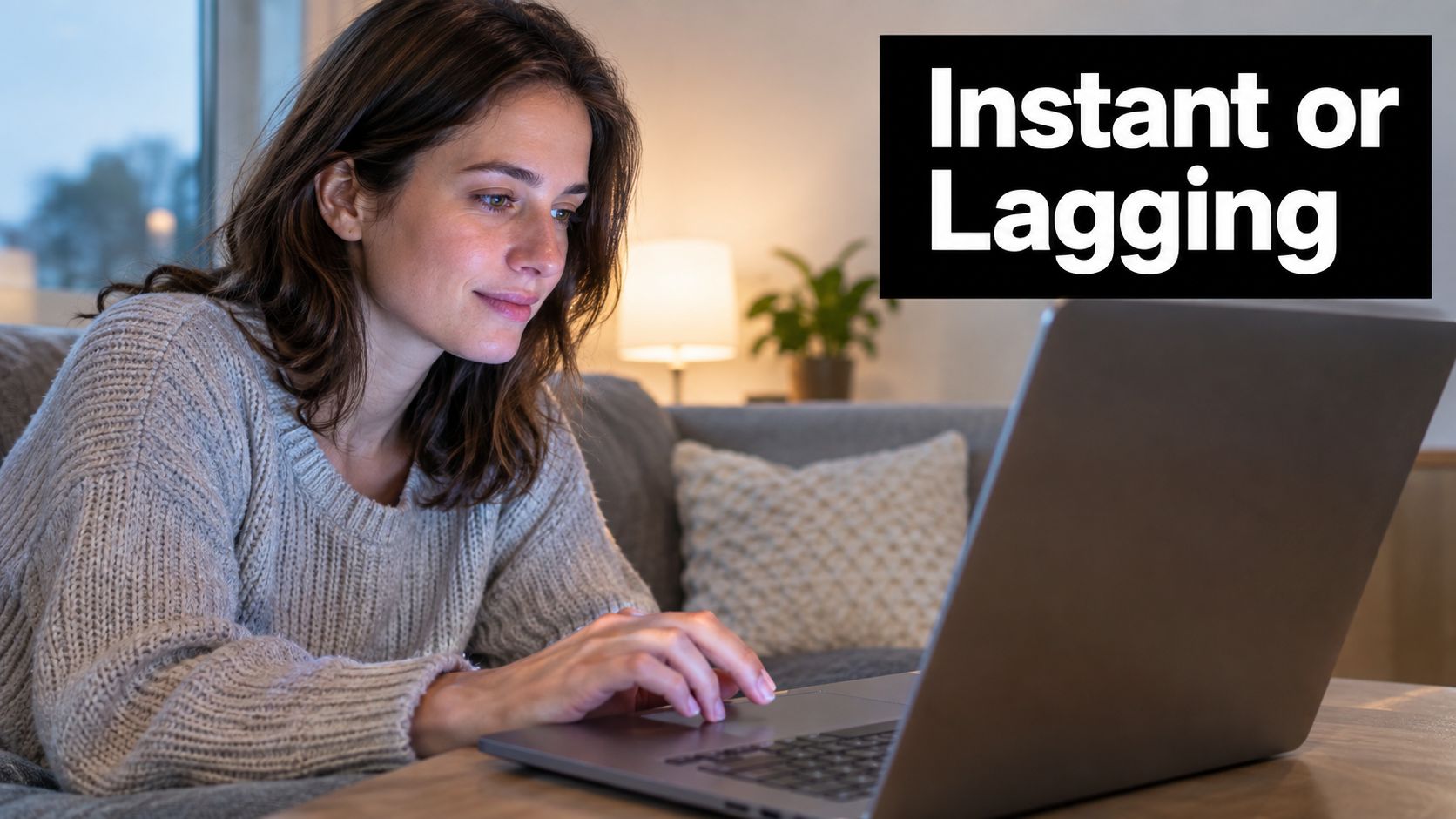A woman using a laptop computer on a couch, focusing on the concept of instant or lagging performance.