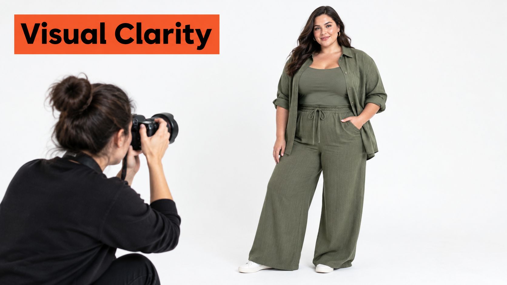 A professional photographer taking a picture of a smiling plus size model in green matching sets.