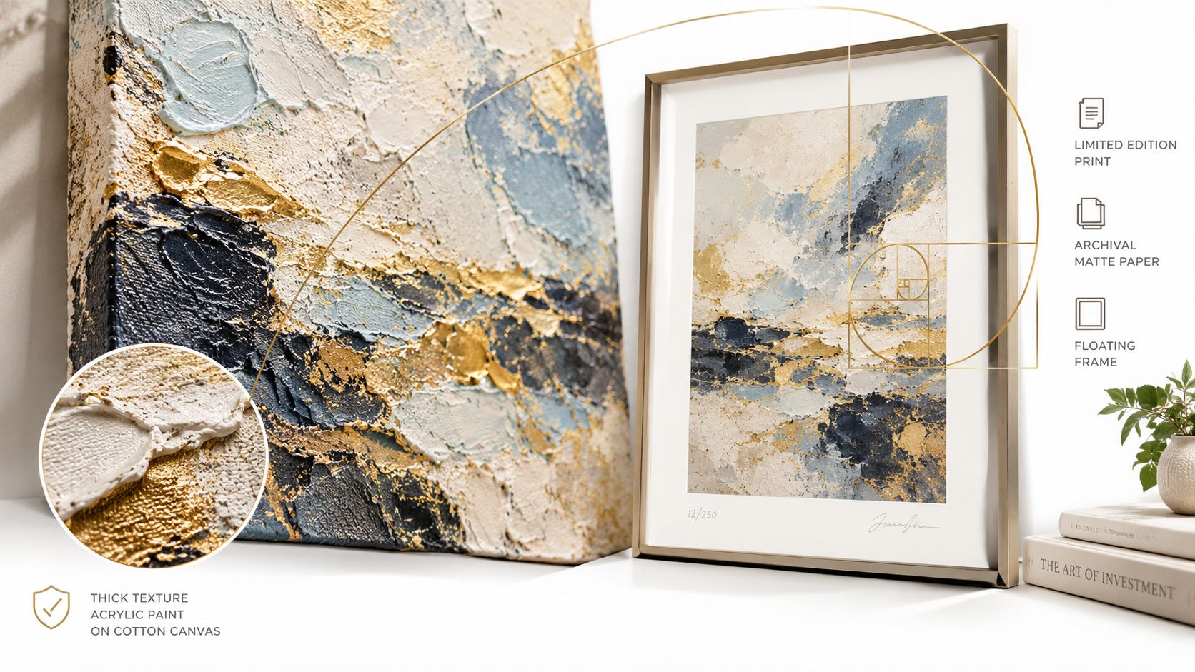 A framed abstract art print on a table alongside a textured canvas showing gold and blue tones.