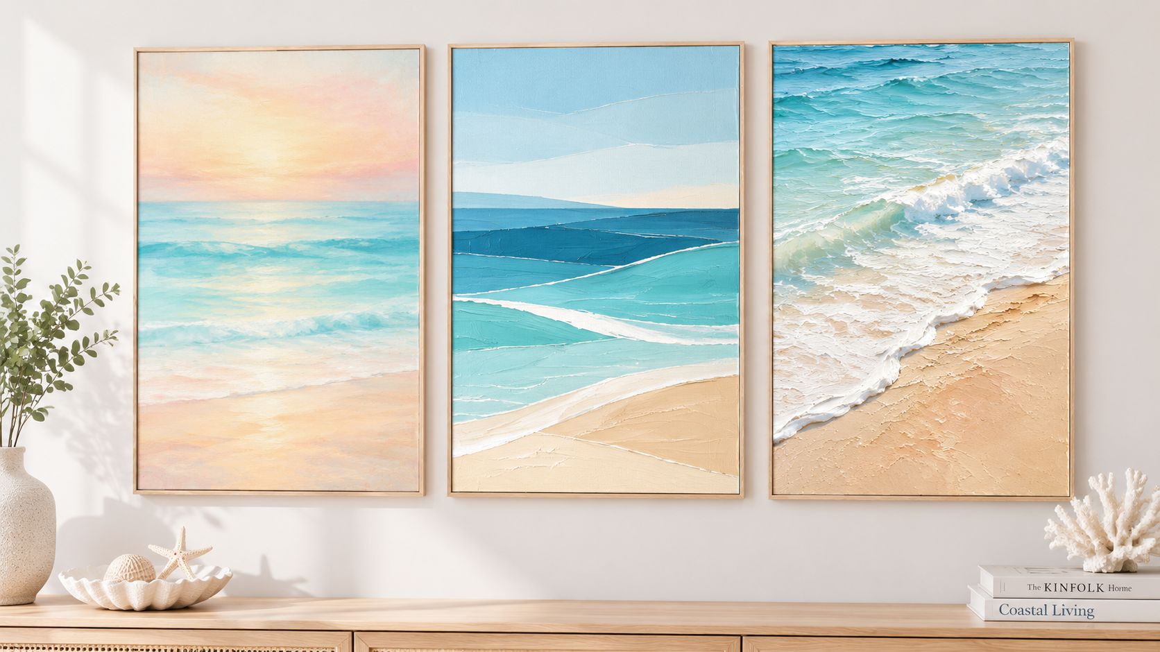 A triptych of abstract beach paintings featuring ocean waves and sandy shores, displayed above a wooden console table.