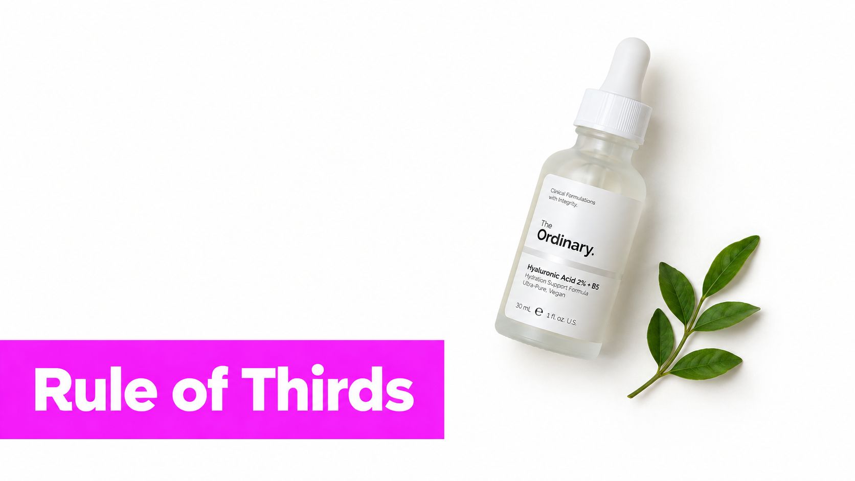 A skincare product bottle by The Ordinary placed on a white background with green leaves nearby.