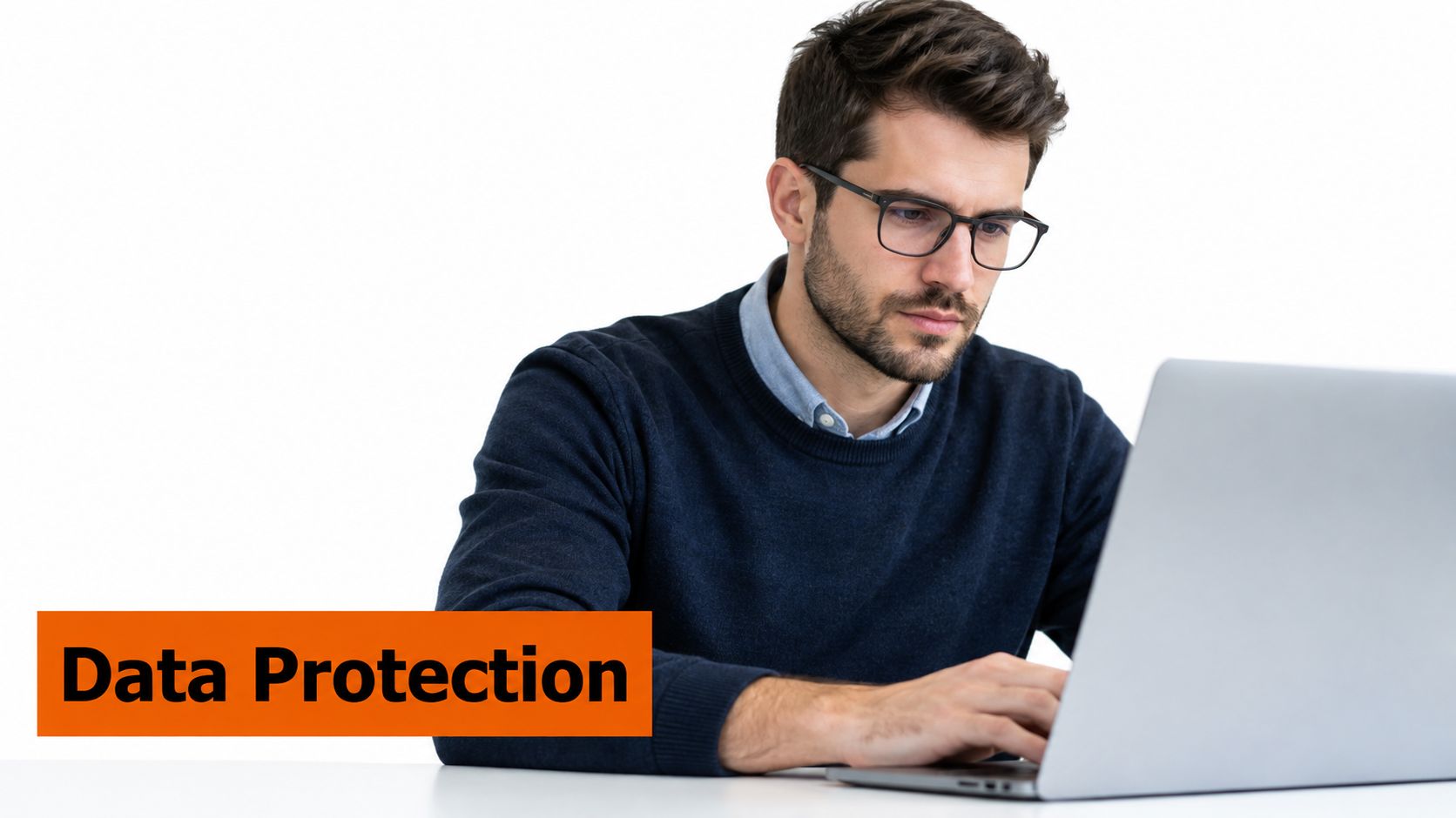 A man wearing glasses working on a laptop with an orange Data Protection label overlay.