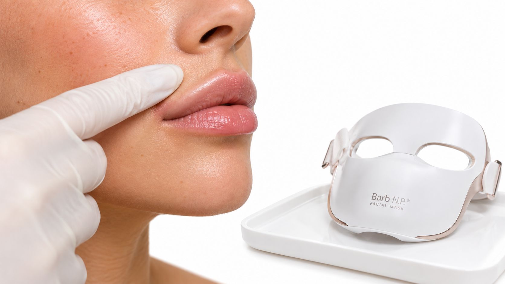 A gloved finger touching the edge of a woman's lips next to a professional LED face mask.