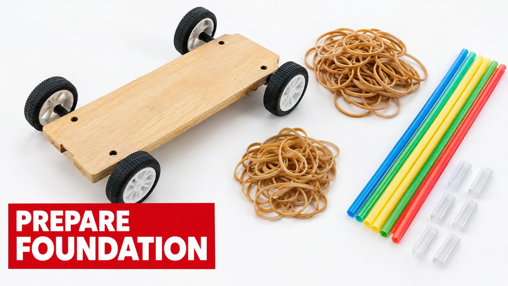 A wooden toy car chassis with wheels, rubber bands, and plastic straws on a white background.