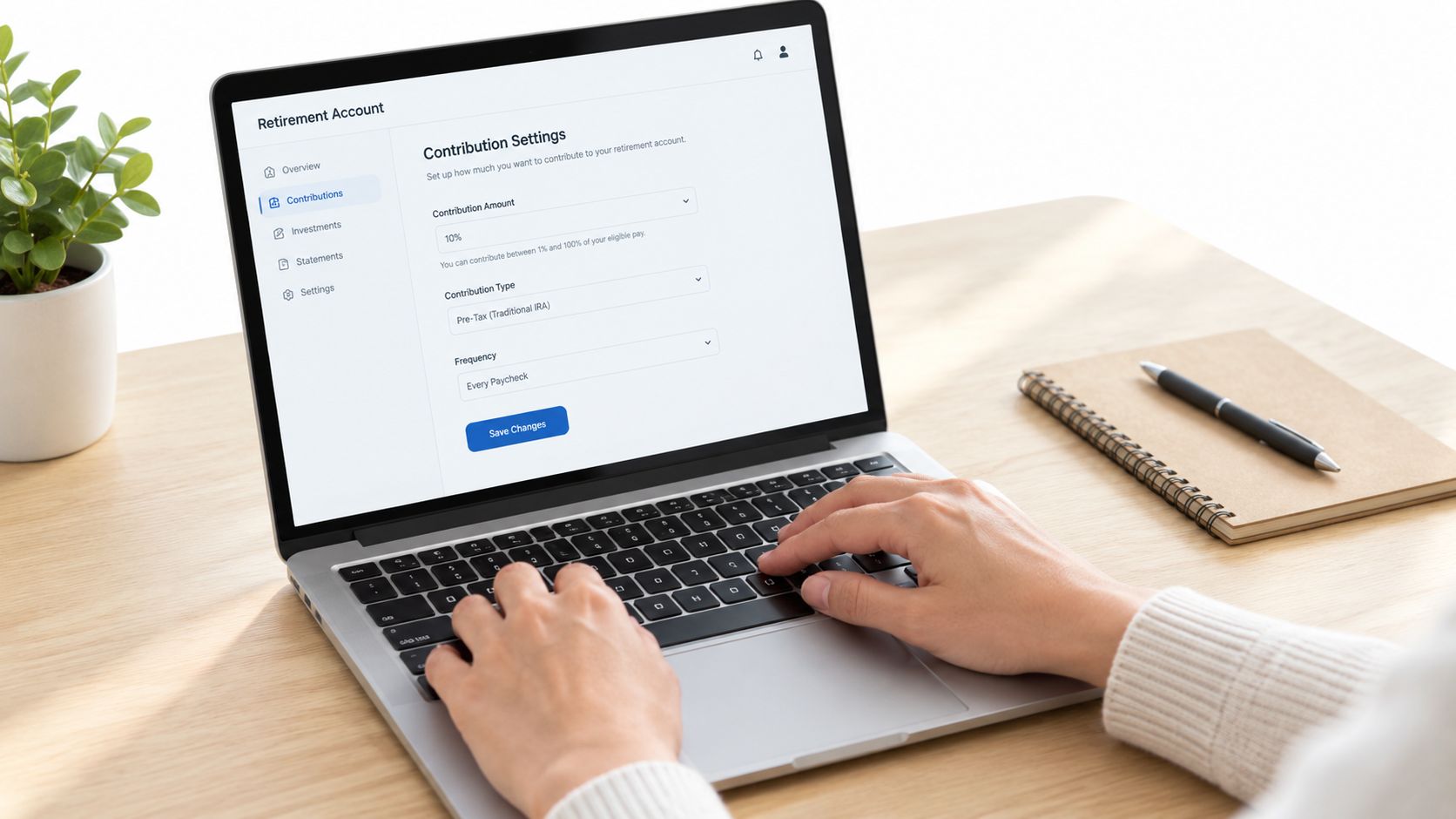 A person using a laptop to update their retirement account contribution settings on a digital dashboard.