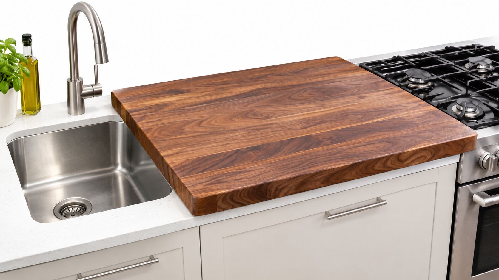 A large rectangular wooden cutting board resting over a stainless steel kitchen sink next to a stove.