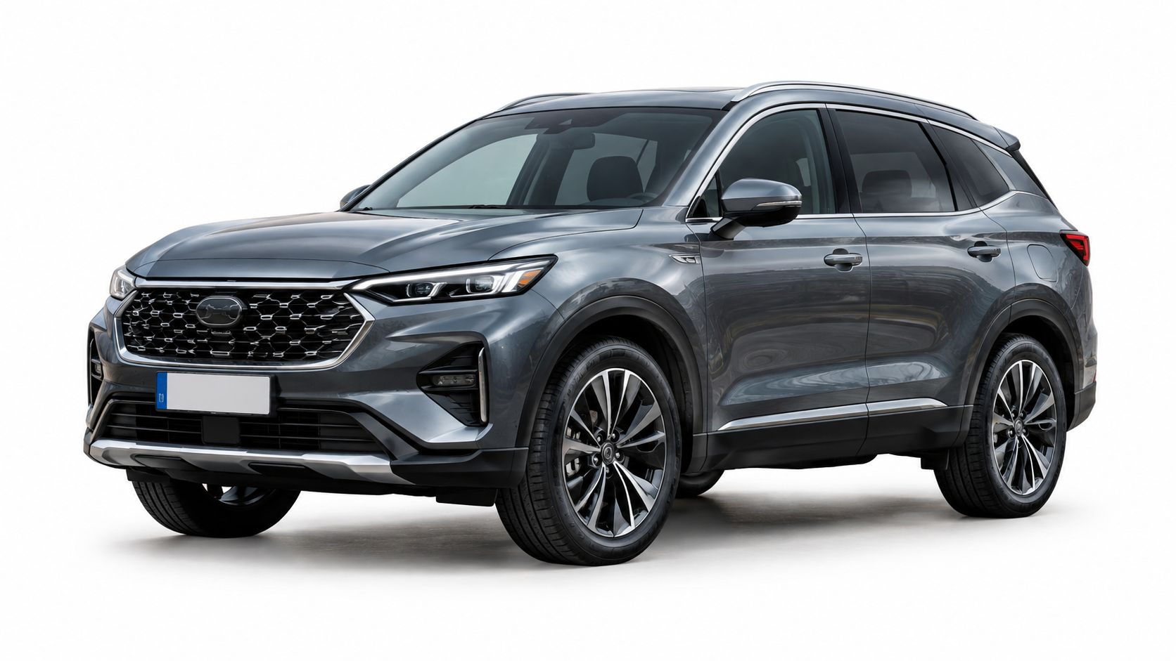 A modern grey SUV parked against a plain white background, showcasing its sleek design and alloy wheels.